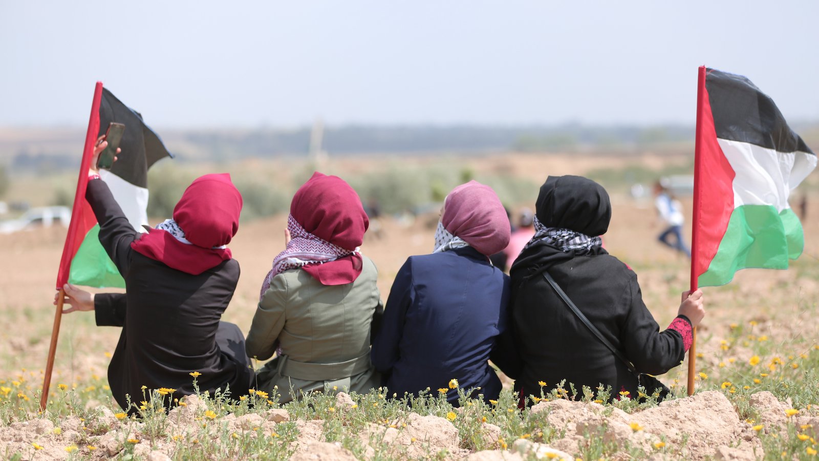 Palestinian women with flags