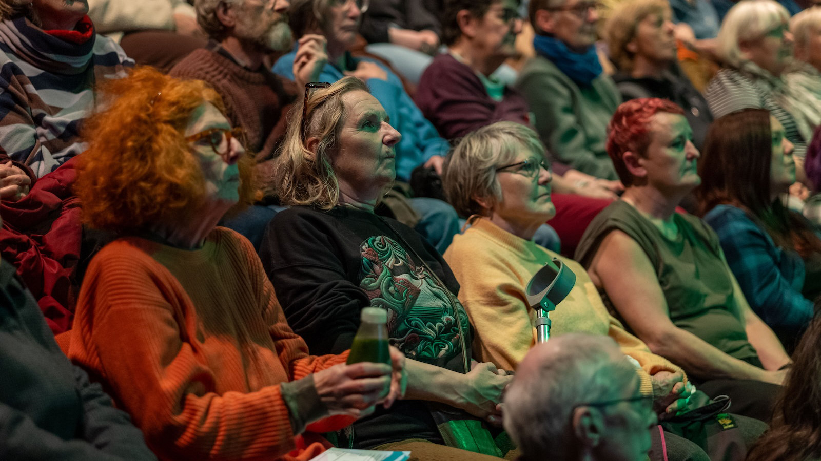 Palestinian man climbing a rock face.